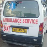 Rear of the Maruti Eeco ambulance with 24X7 Ambulance Service lettering