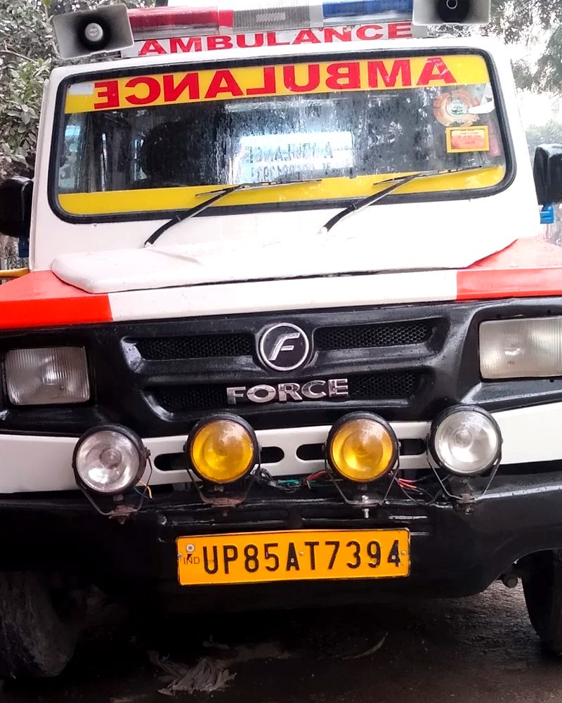Force freezer box van of R.N Ambulance Service — Reg. UP85AT7394
