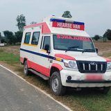 Mahindra Bolero hearse van parked by the roadside