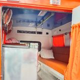 Steel freezer box compartment inside the orange-body freezer van